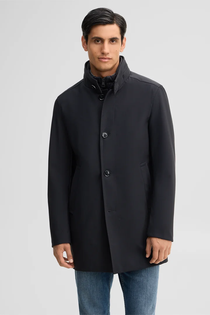 Leads to product detail page "Finlay-Flex Coat in Dark Blue"