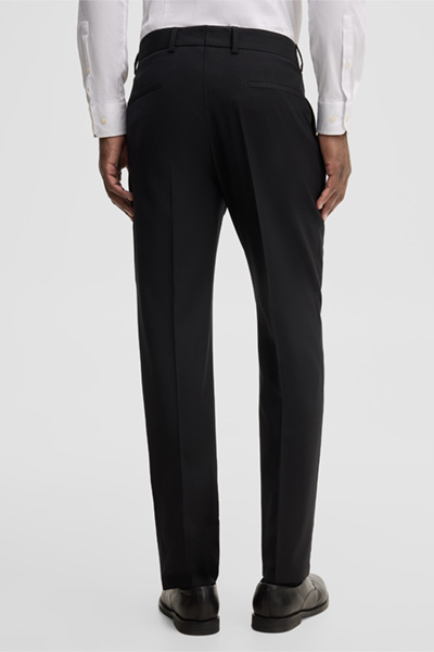 Leads to product detail page "Modular trousers in a wool blend, black"