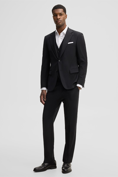 Leads to product detail page "Modular trousers in a wool blend, black"