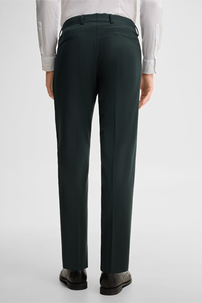 Leads to product detail page "Modular trousers in a wool blend, green"