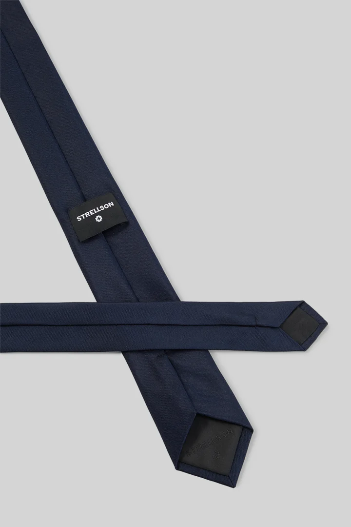 Leads to product detail page "Pure silk tie, navy"