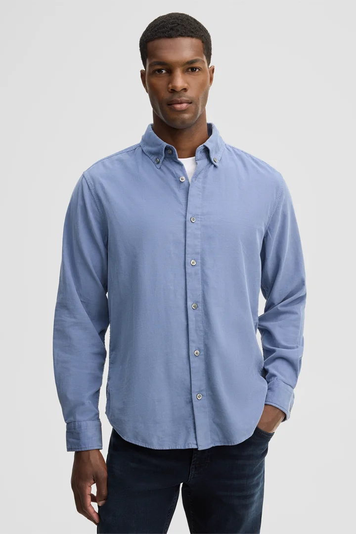 Leads to product detail page "Casual cotton shirt, light blue"