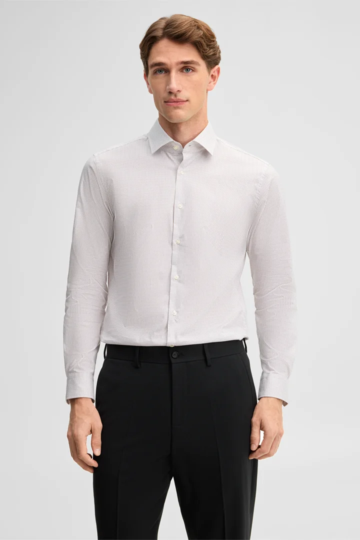 Leads to product detail page "Stretch shirt with a Kent collar, white"