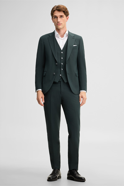 Leads to product detail page "Modular trousers in a wool blend, green"