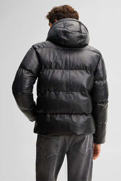 Leads to product detail page "Padded leather jacket, black"