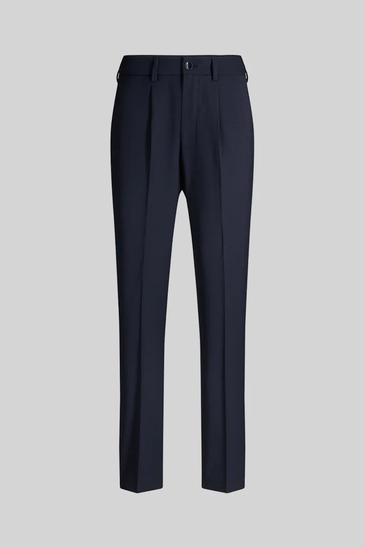 Leads to product detail page "Modular trousers in a wool blend, navy"