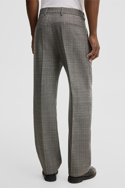 Leads to product detail page "Modular trousers made from virgin wool, anthracite"