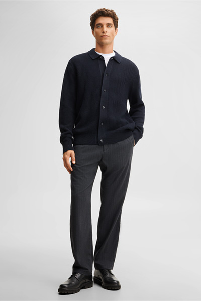 Leads to product detail page "Knitted polo shirt, navy"
