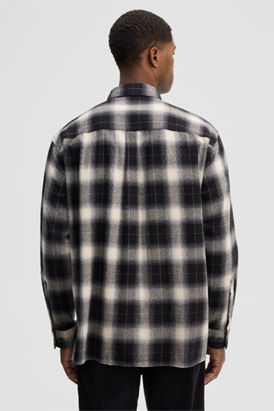Leads to product detail page "Cotton shirt, black/ecru"