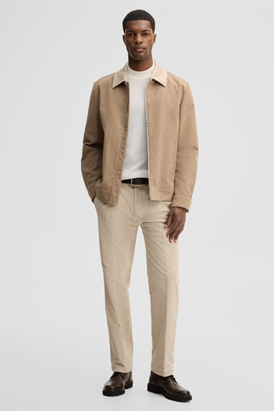 Leads to product detail page "Jacket with a shirt collar, beige"