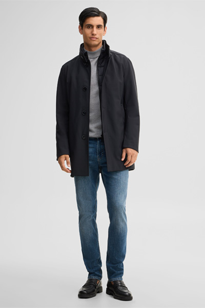 Leads to product detail page "Finlay-Flex Coat in Dark Blue"