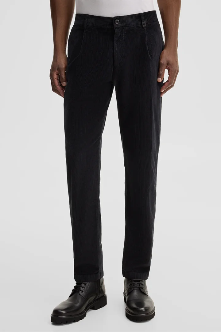 Leads to product detail page "Stretch corduroy chinos, black"