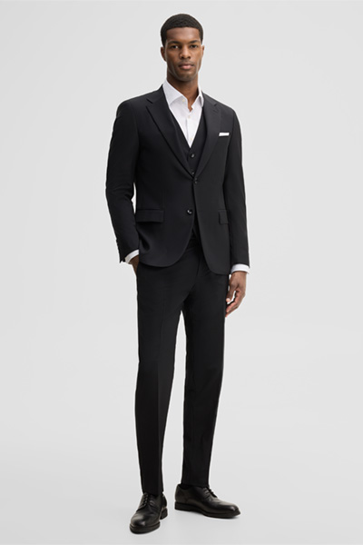 Leads to product detail page "Modular trousers in a wool blend, black"