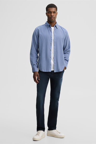 Leads to product detail page "Casual cotton shirt, light blue"