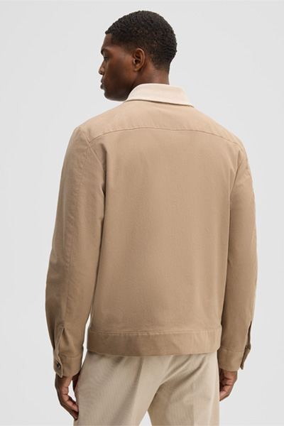 Leads to product detail page "Jacket with a shirt collar, beige"