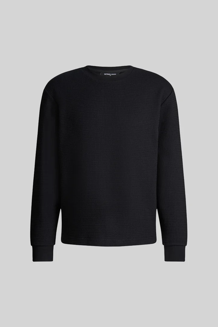 Leads to product detail page "Round-neck jumper, black"