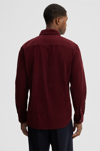 Leads to product detail page "Casual cotton shirt, burgundy"