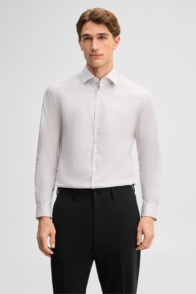 Leads to product detail page "Stretch shirt with a Kent collar, white"