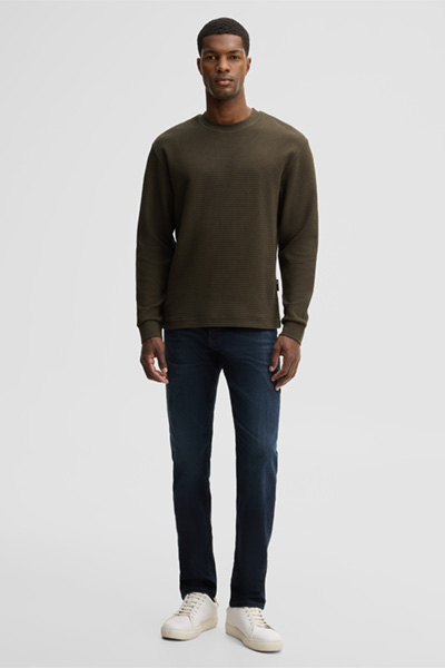 Leads to product detail page "Round-neck jumper, olive"