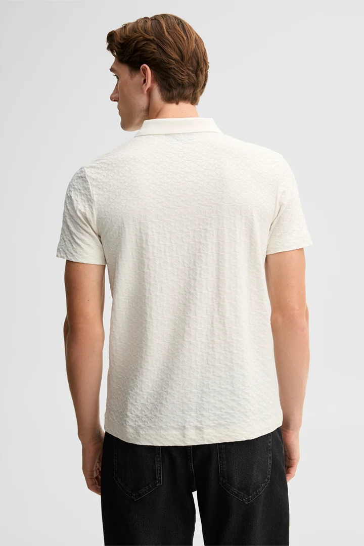 Führt zu Produktdetailseite „Poloshirt aus reiner Baumwolle, offwhite"