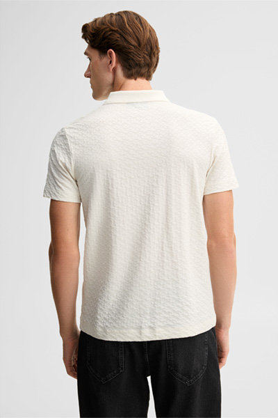 Leads to product detail page "Pure cotton polo shirt, off-white"