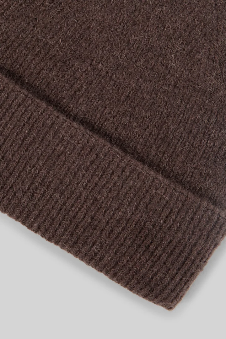 Führt zu Produktdetailseite „Mütze aus Wollmix, braun"