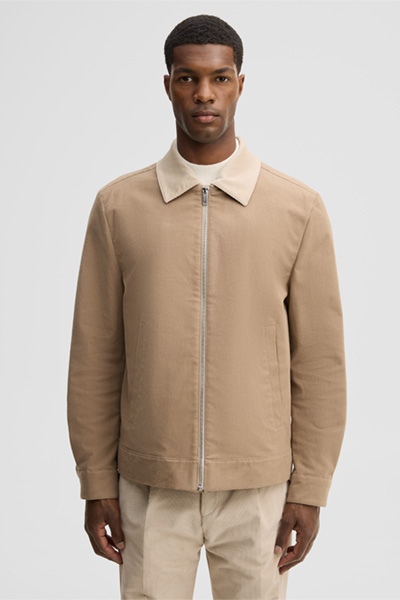 Leads to product detail page "Jacket with a shirt collar, beige"