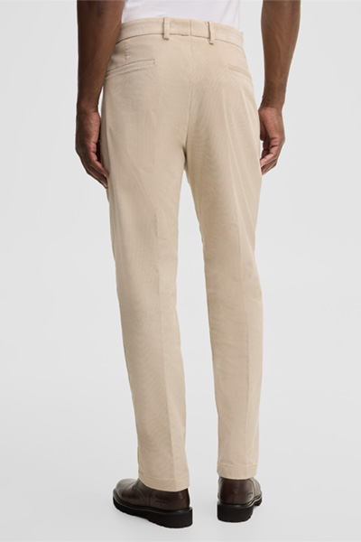 Leads to product detail page "Modular trousers in a cotton blend, off-white"