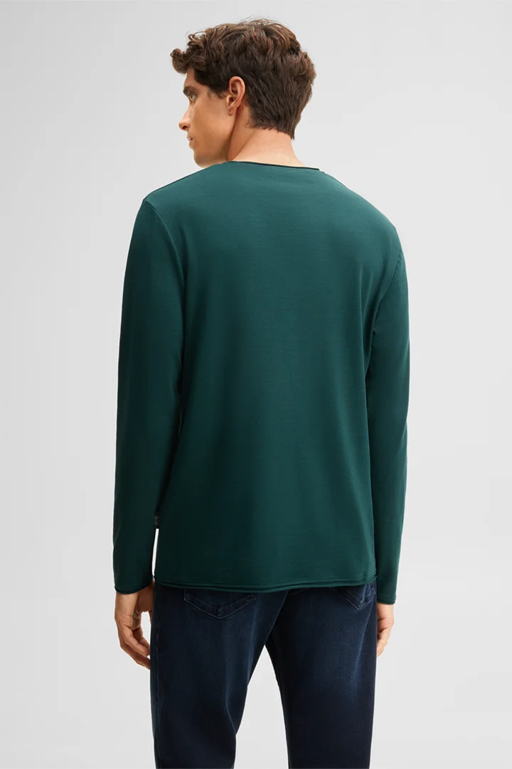 Mène à la page produit « T-shirt à manches longues en mélange de coton, couleur pétrole »