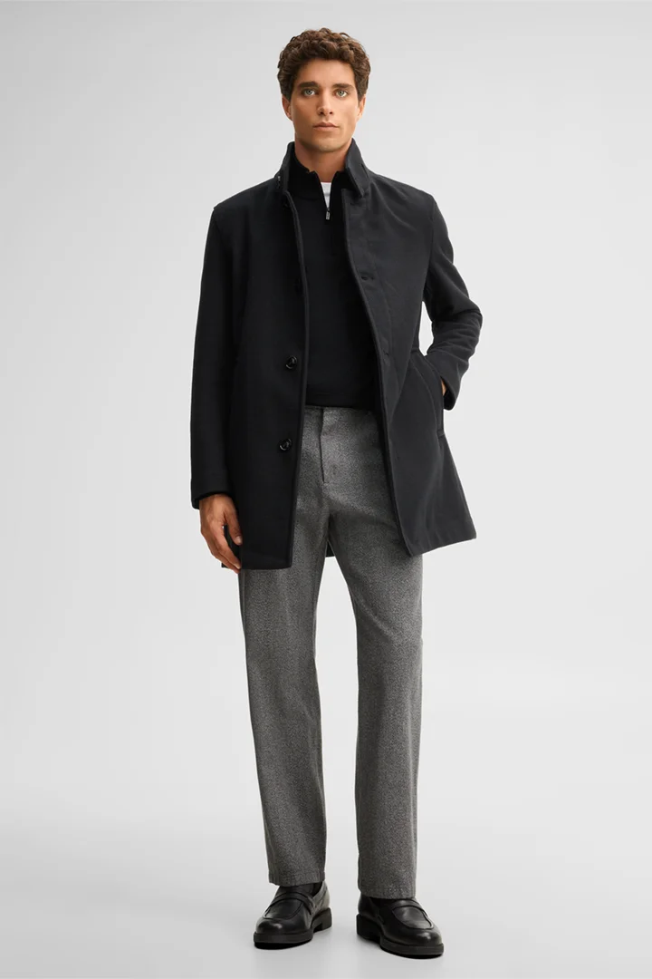 Leads to product detail page "Coat with a stand-up collar, black"
