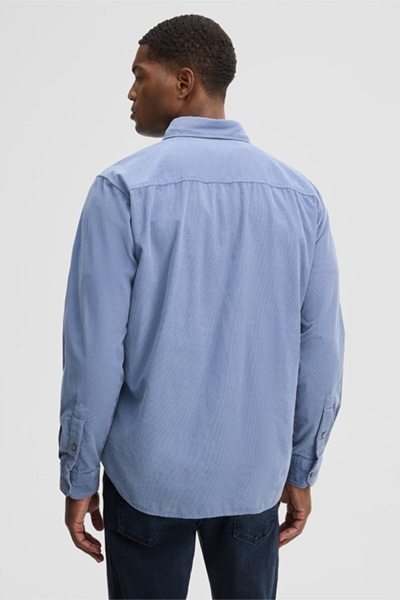 Leads to product detail page "Casual cotton shirt, light blue"