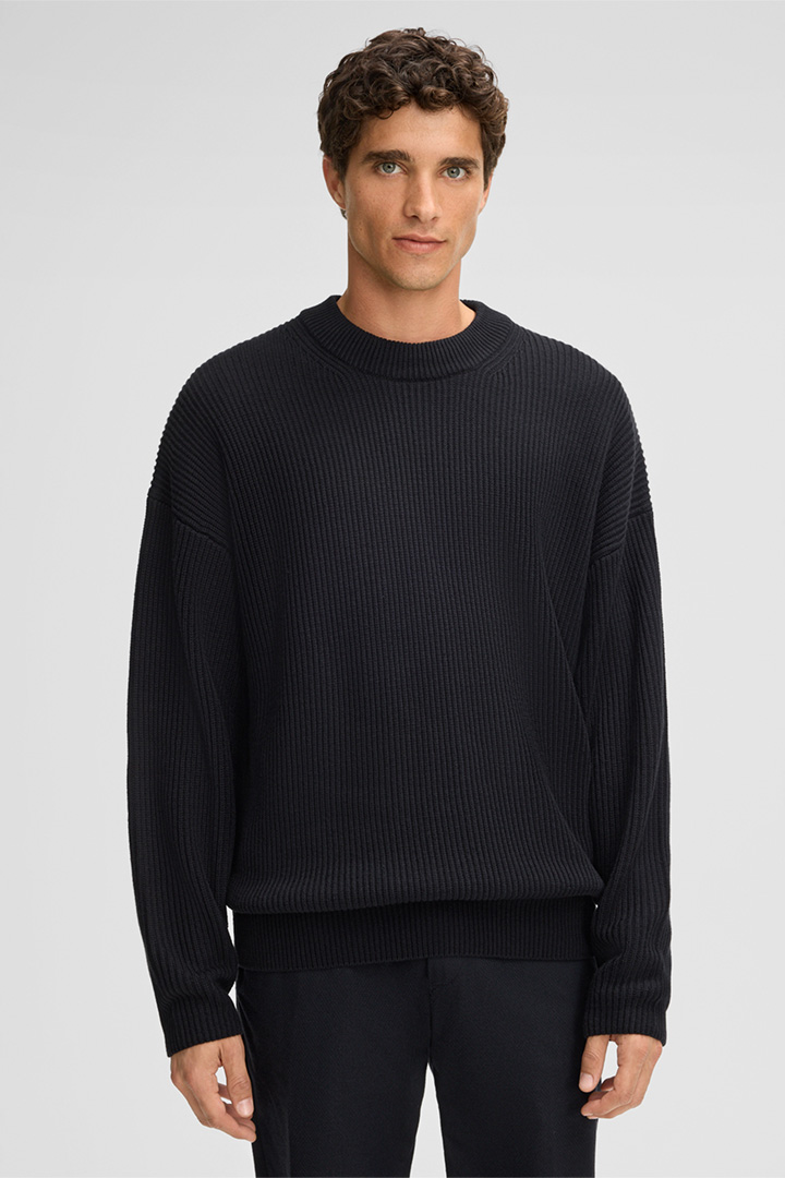 Leads to product detail page "Hades Jumper in Black"