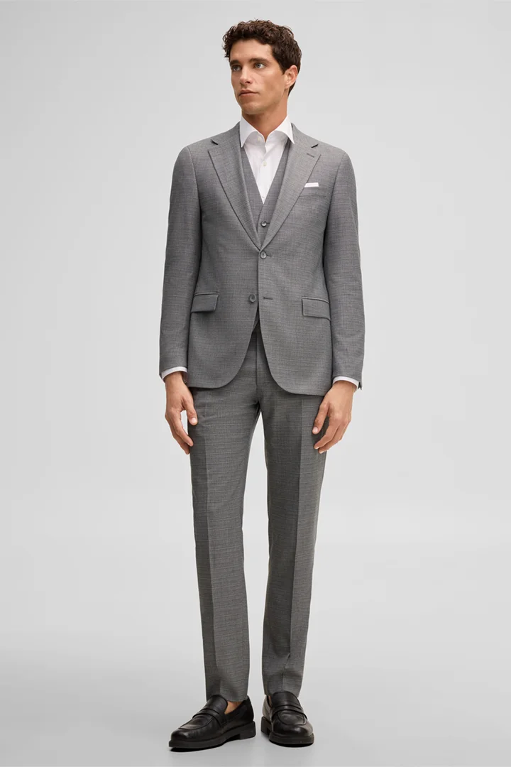 Mène à la page produit « Pantalon de costume modulable Kynd, gris »