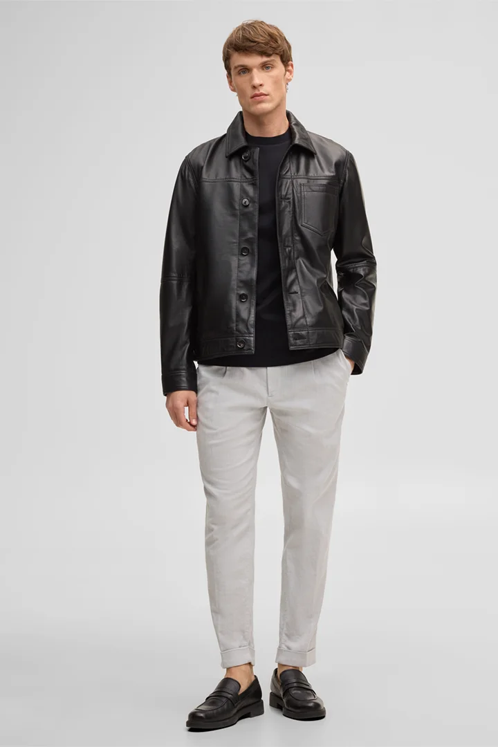 Leads to product detail page "Flint leather jacket, black"