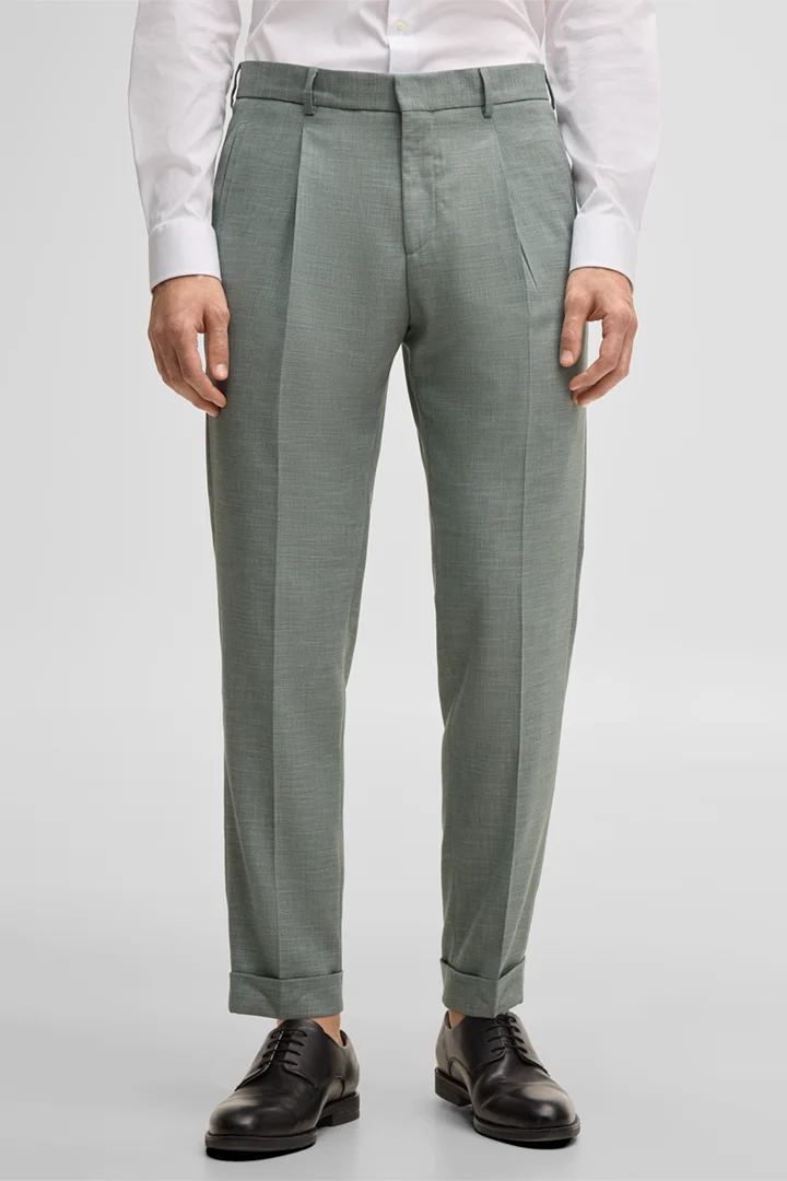 Leads to product detail page "Modular suit trousers Luis, green"
