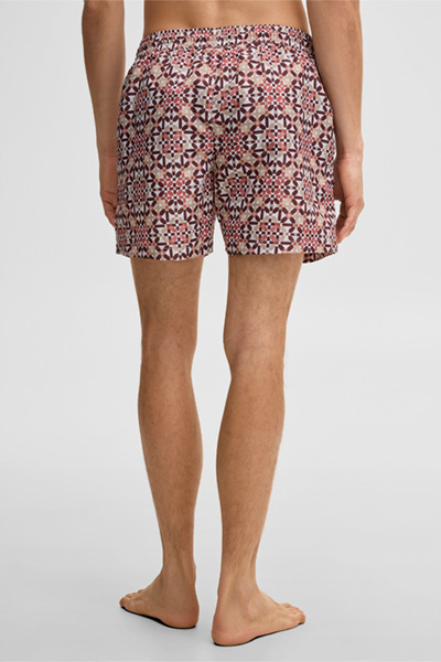 Mène à la page produit « Short de bain Lago, à motifs rouges et blancs »