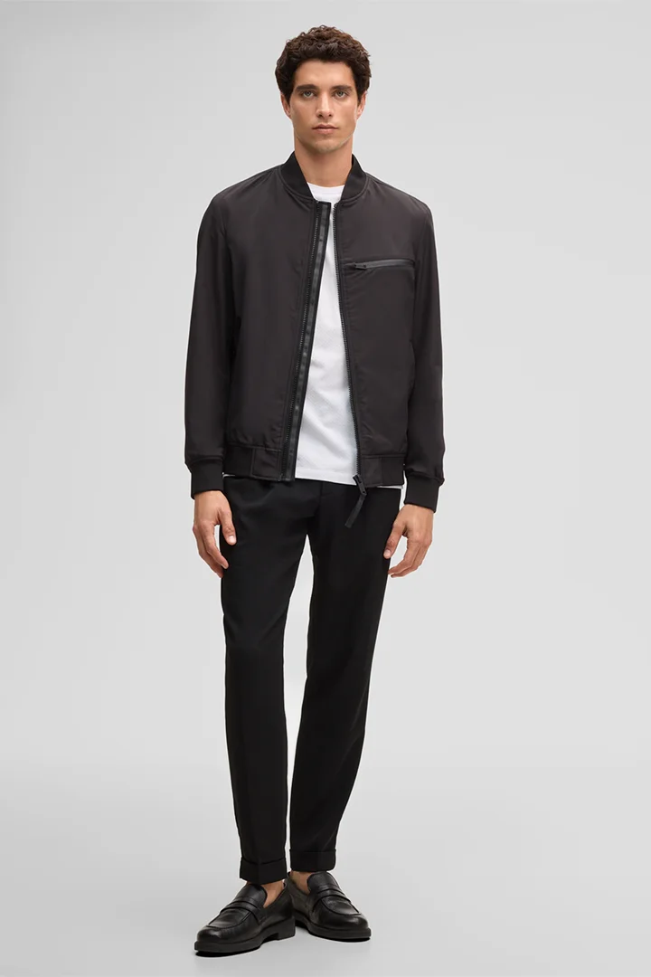 Leads to product detail page "Flex Cross Jacket Clearwater, black"