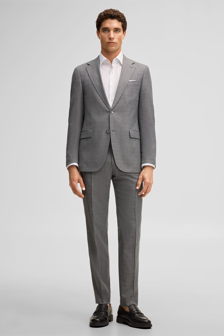 Leads to look detail page “Alzer-Kynd Modular Suit in Grey”