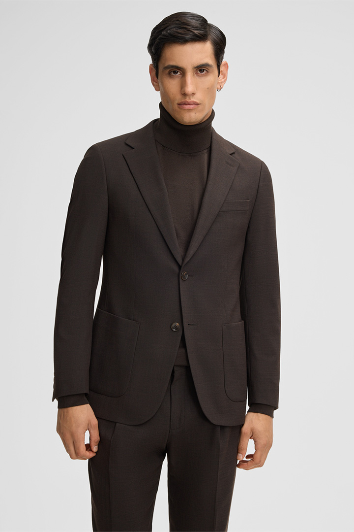 Leads to product detail page "Arndt Jacket in Dark Brown"