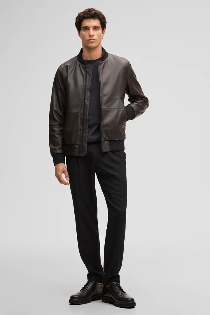 Leads to product detail page "Boston leather jacket, dark brown"