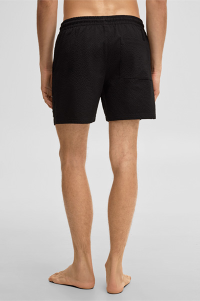 Führt zu Produktdetailseite „Badeshorts Malo, schwarz"