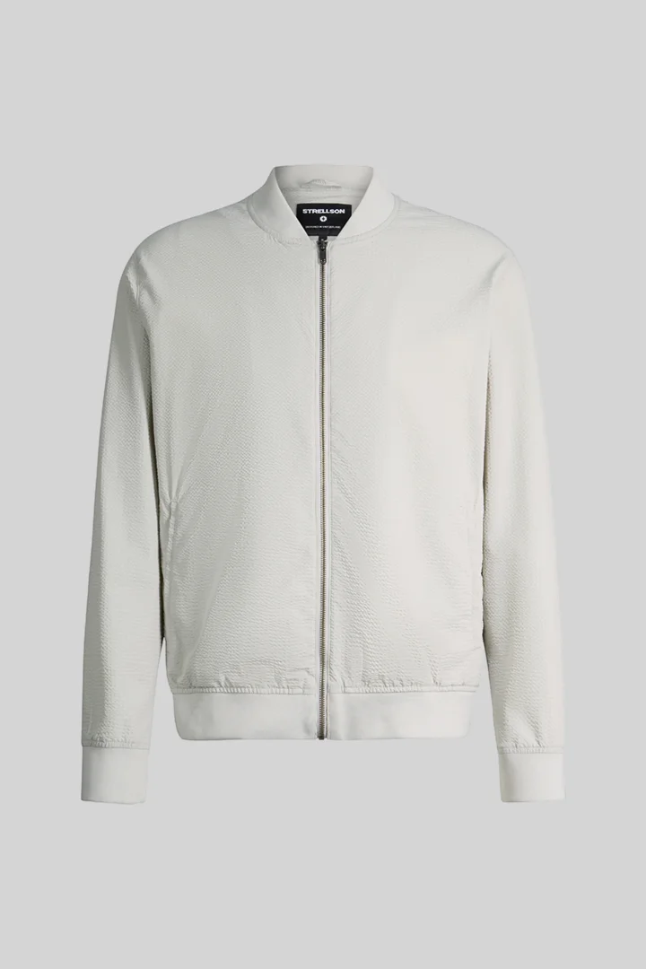 Leads to product detail page "Jason jacket, light grey"