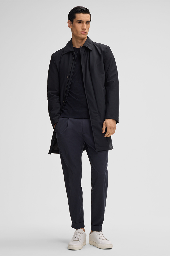 Leads to product detail page "Naro Coat in Dark Blue"