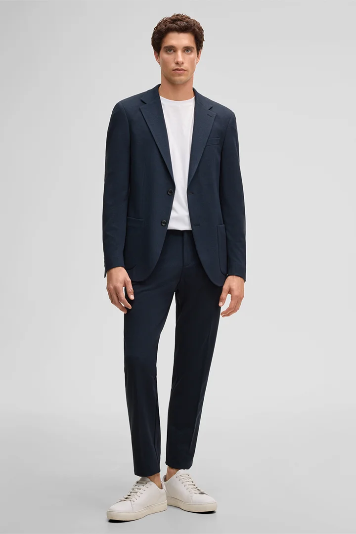 Leads to product detail page "Modular suit trousers Tius, navy"