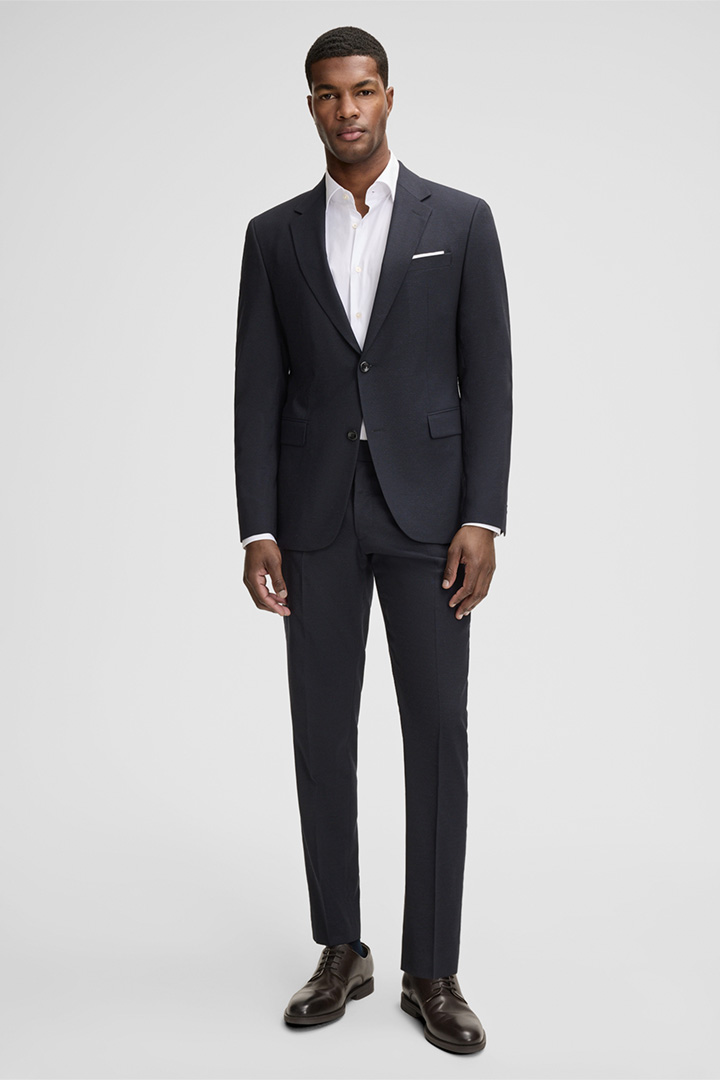 Leads to product detail page "Aidan Jacket in Dark Blue"