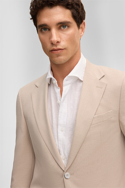 Führt zu Produktdetailseite „Anzug Alzer Kynd, beige"
