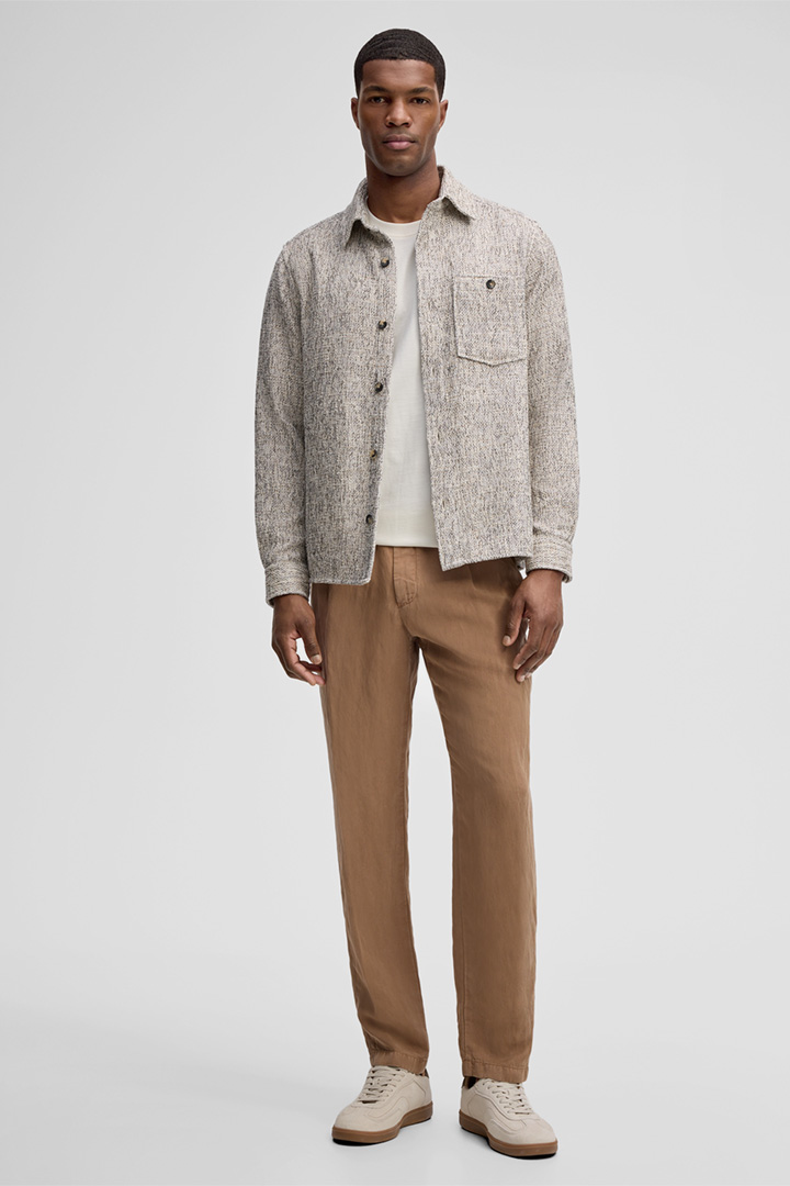 Leads to product detail page "Niu Shirt in Beige Marl"