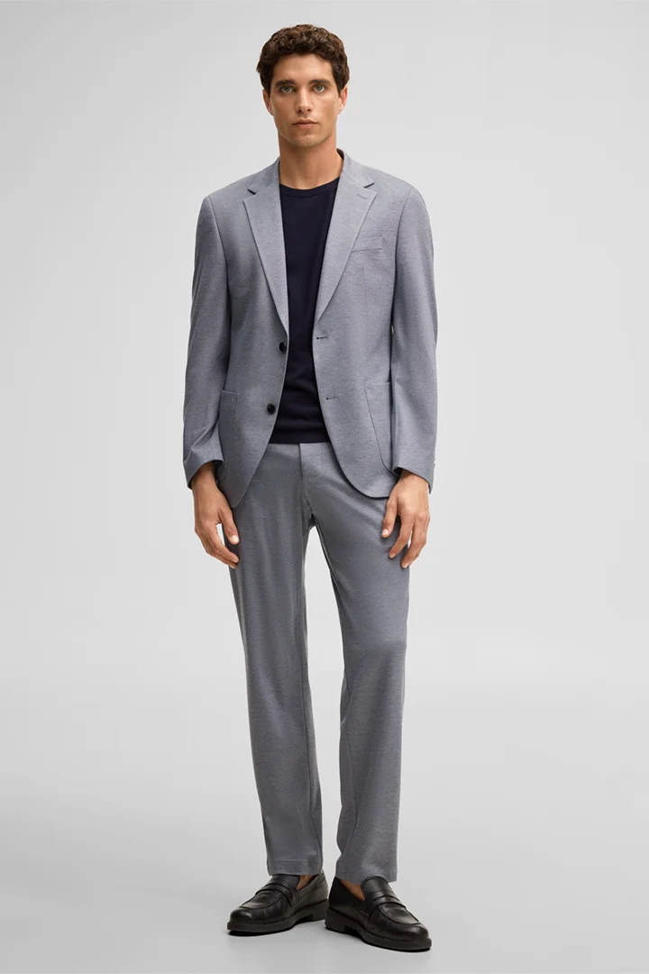 Mène à la page produit « Pantalon de costume modulable Tius, bleu marine »